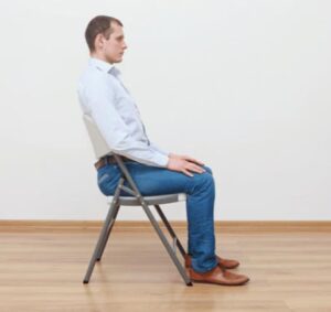 Homme assis droit, travail assis et exerice du plancher pelvien - périnée.